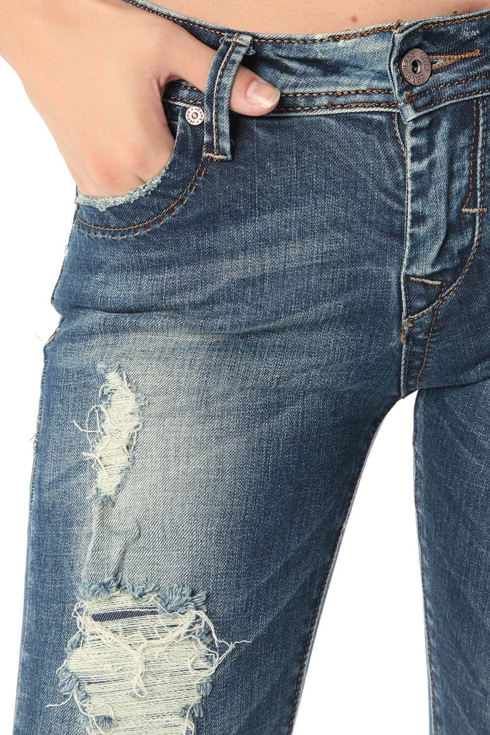 Jean skinny avec déchirures et effet vieilli