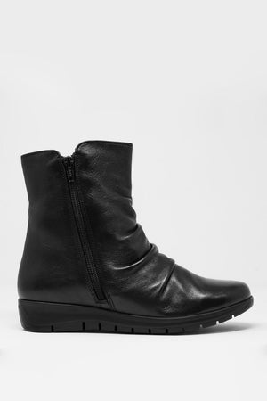 Bottines basses noires avec fermeture éclair et nez rond