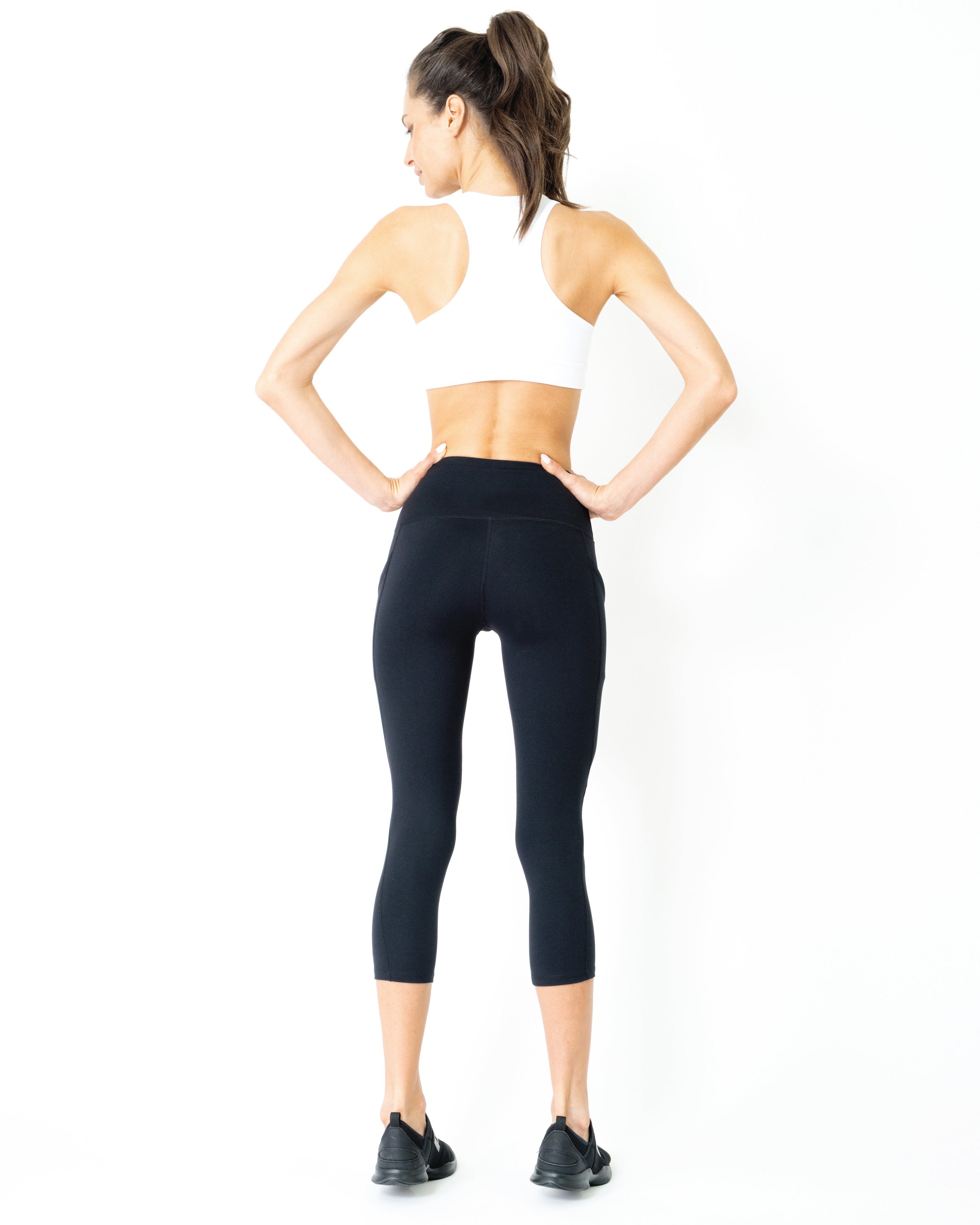 Jolie legging capri taille haute avec poches sur les hanches